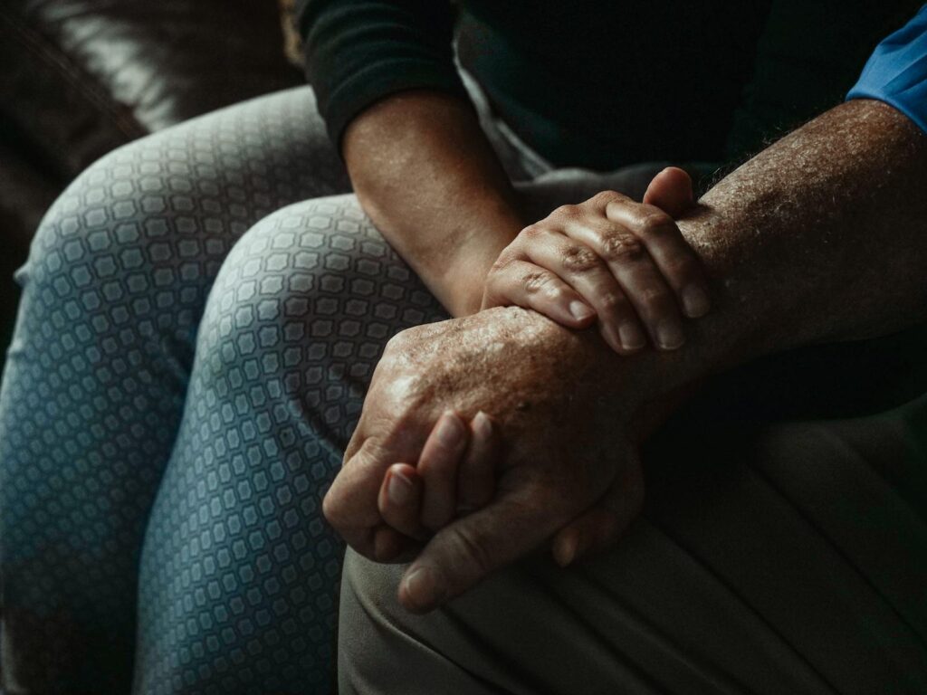 A Close-Up Shot of People Holding Hands