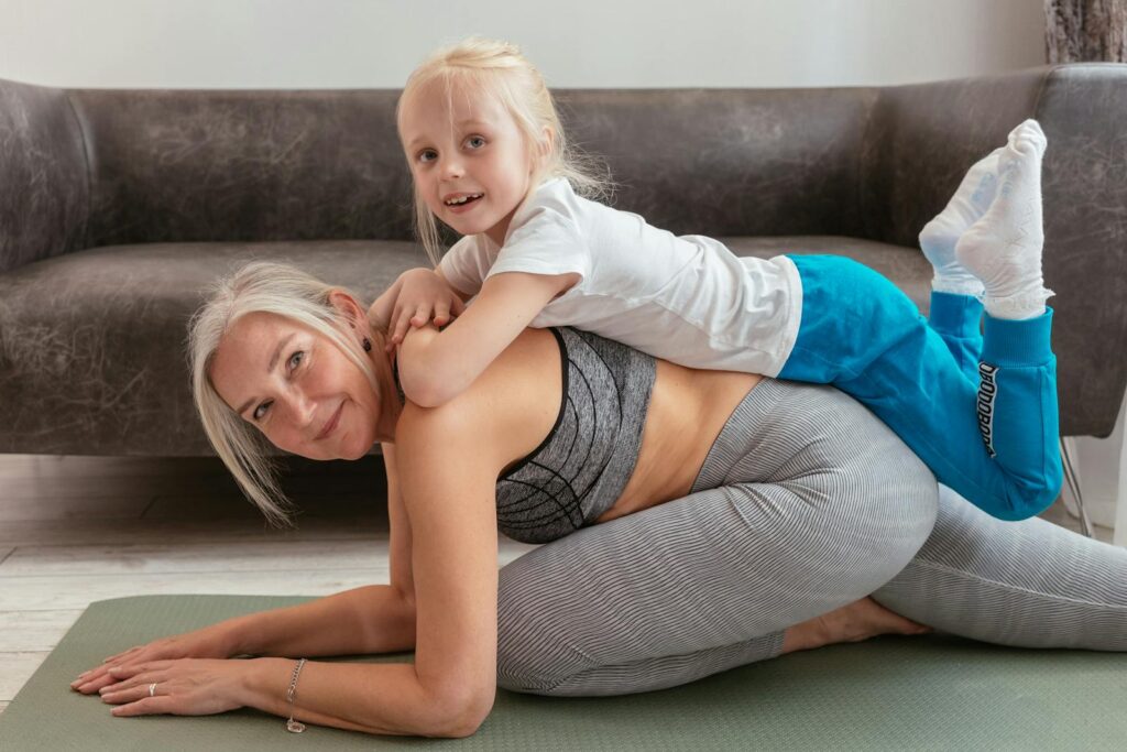 A Grandmother and Grandchild Doing Exercise Together